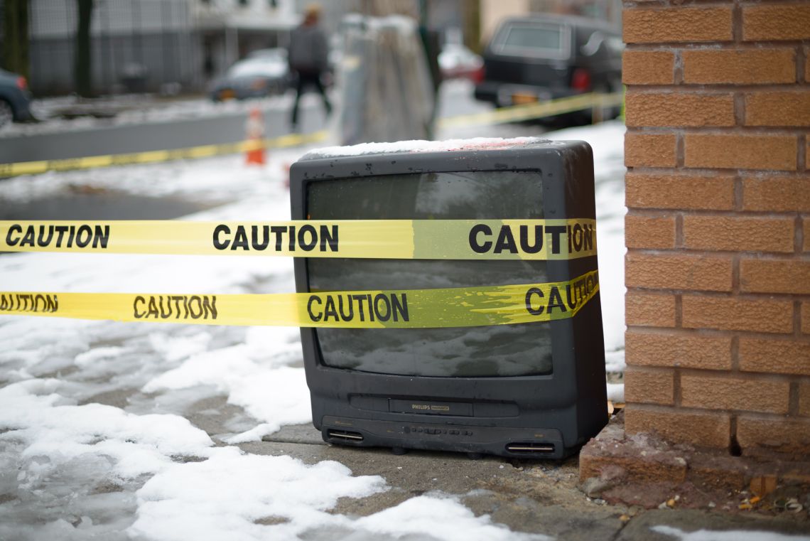 tv with caution tape