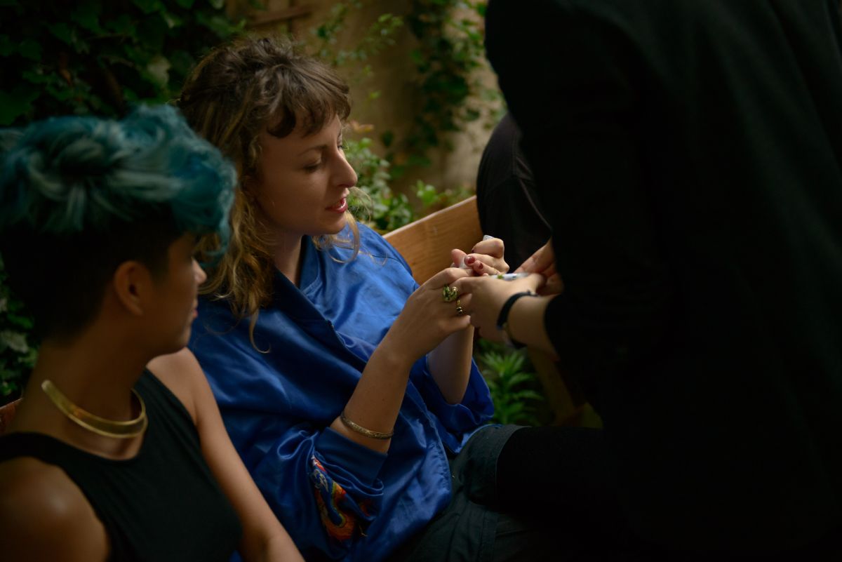 A guest chooses the pheromone she'll soon be wearing.