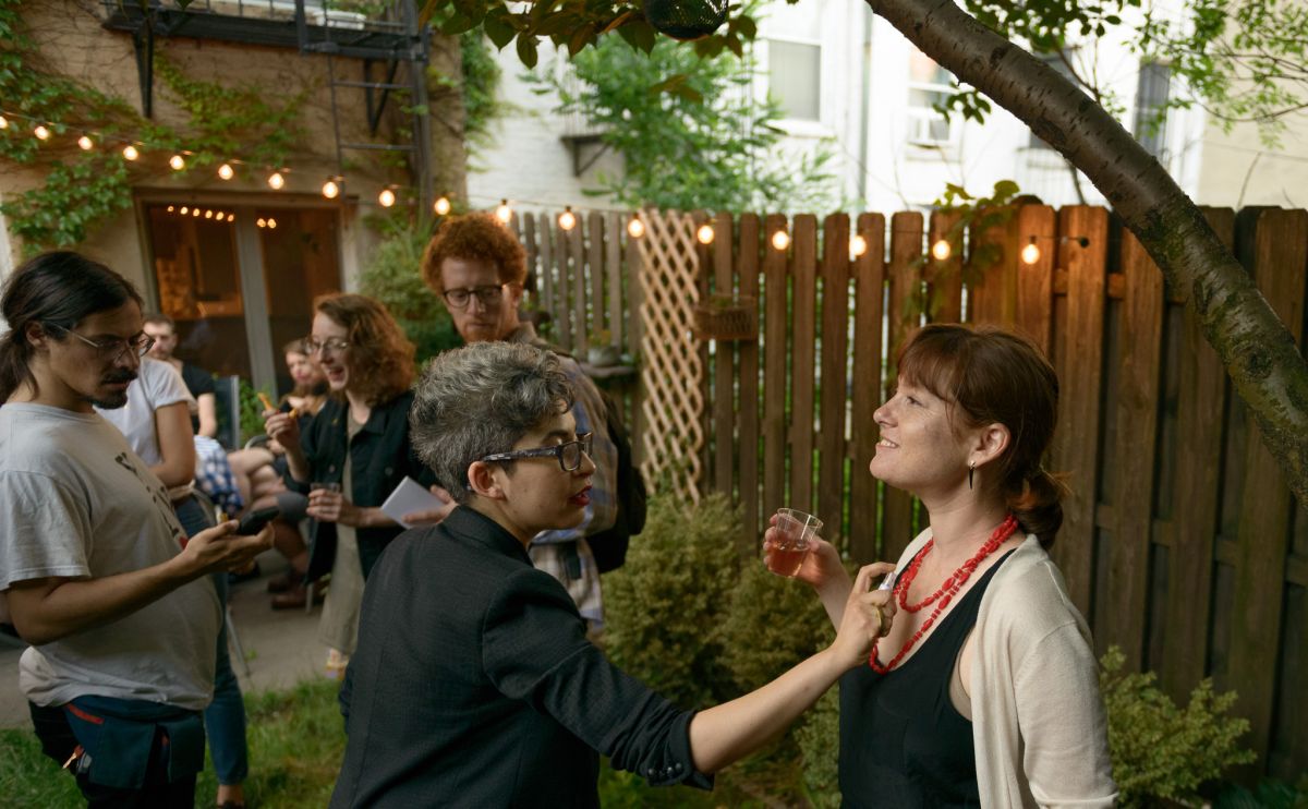A guest is spritzed with a pheromone for women.