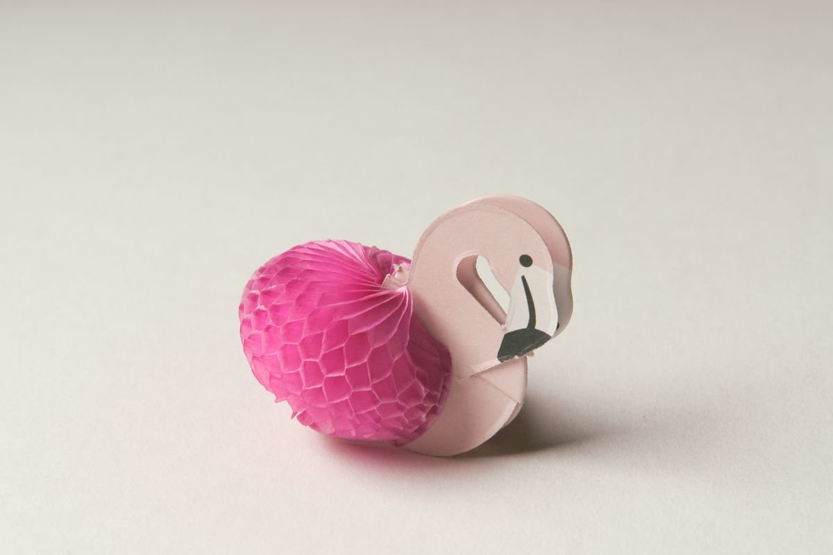 Pink Paper Flamingo on White Paper