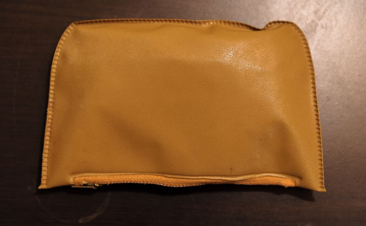 old leathery change purse