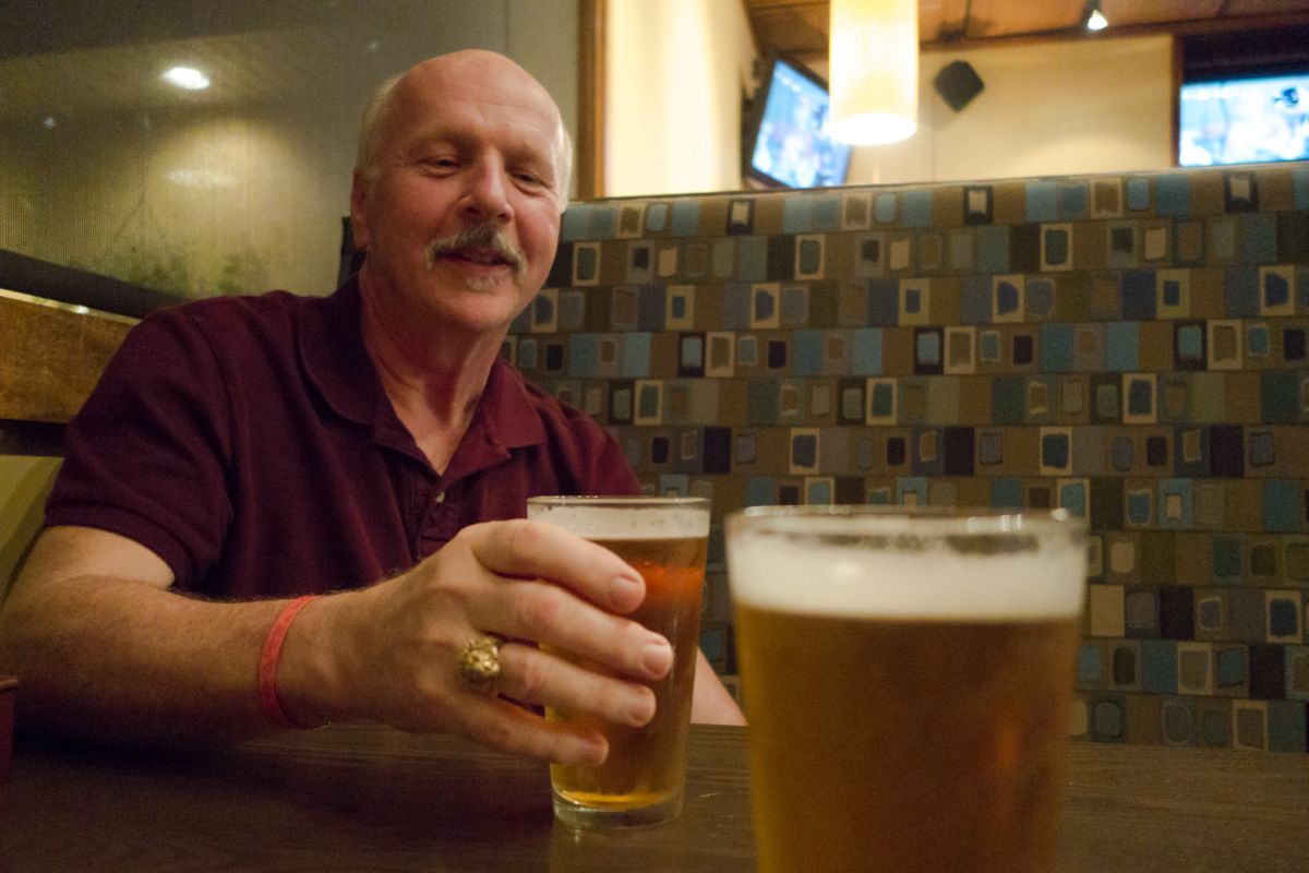 dad reaching for beer