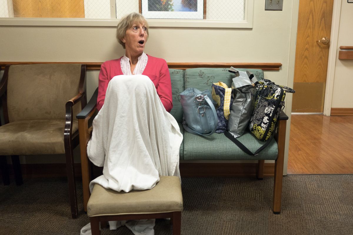 mother on couch hospital waiting room