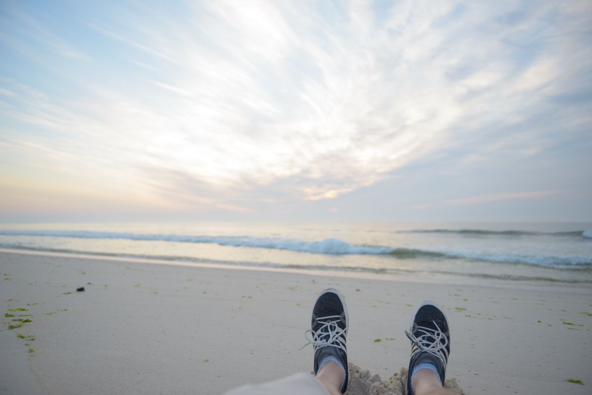 feet in sand sunrise