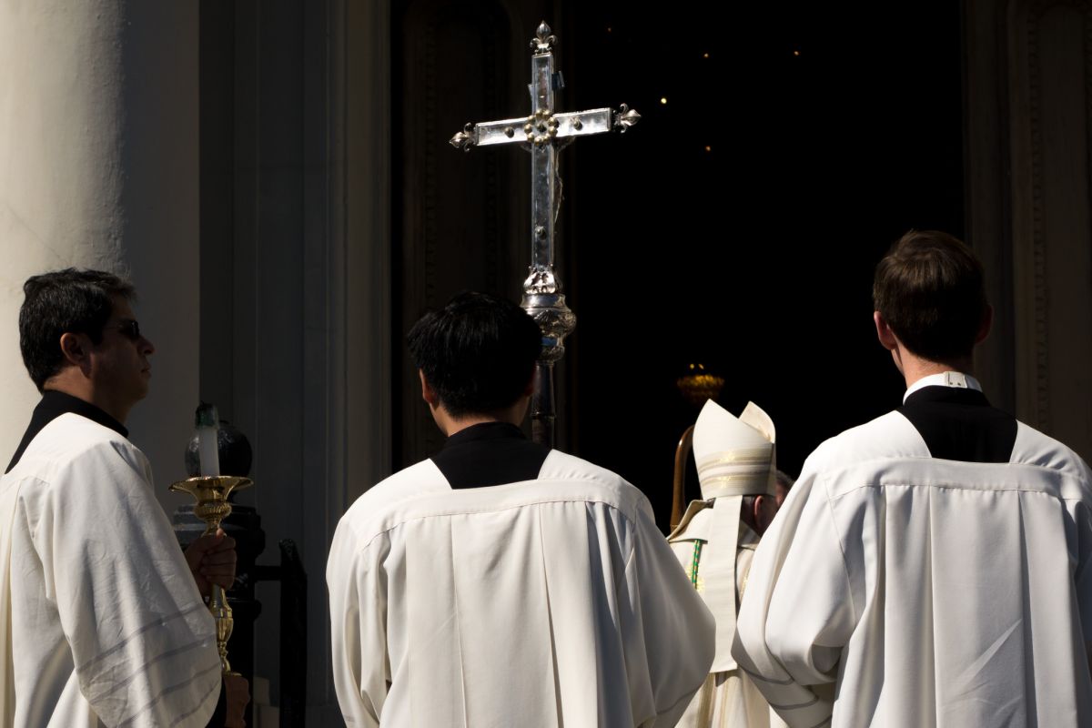 bishop and attendants outside st louis cathedral