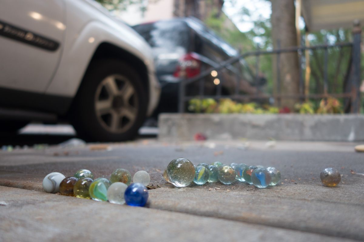 marbles scattered on nyc street