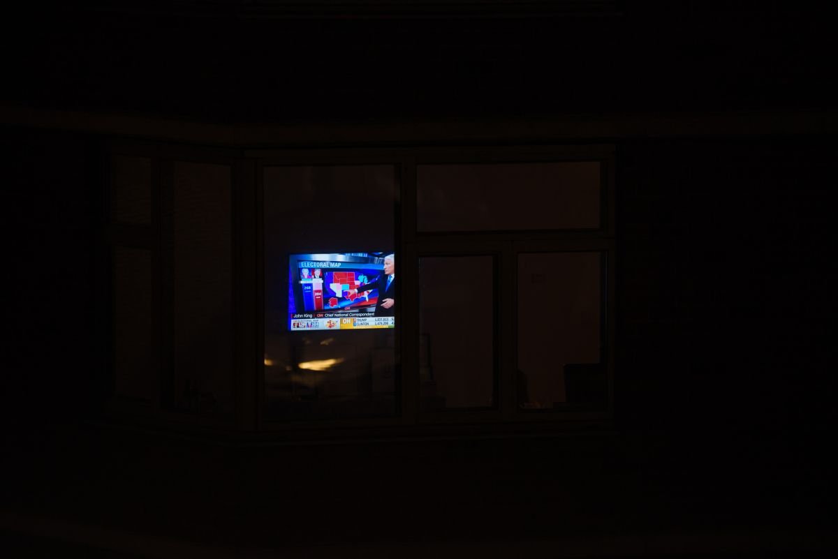 Residents in DUMBO watch election results on TV