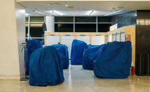 Tarps cover the vendor's wares.