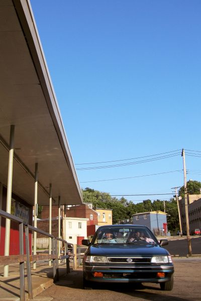 two obese people in a subaru in lawrenceville