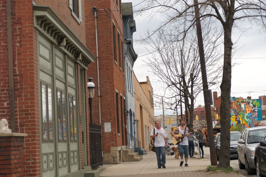 two pittsburgh yinzers on a sidewalk southside singing sublime
