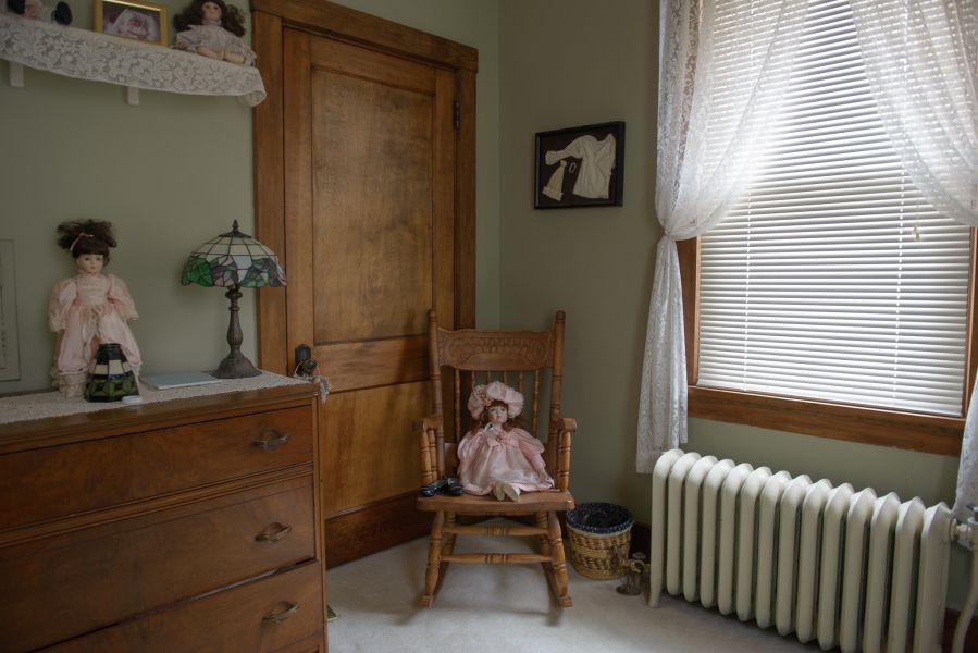 doll in rocking chair