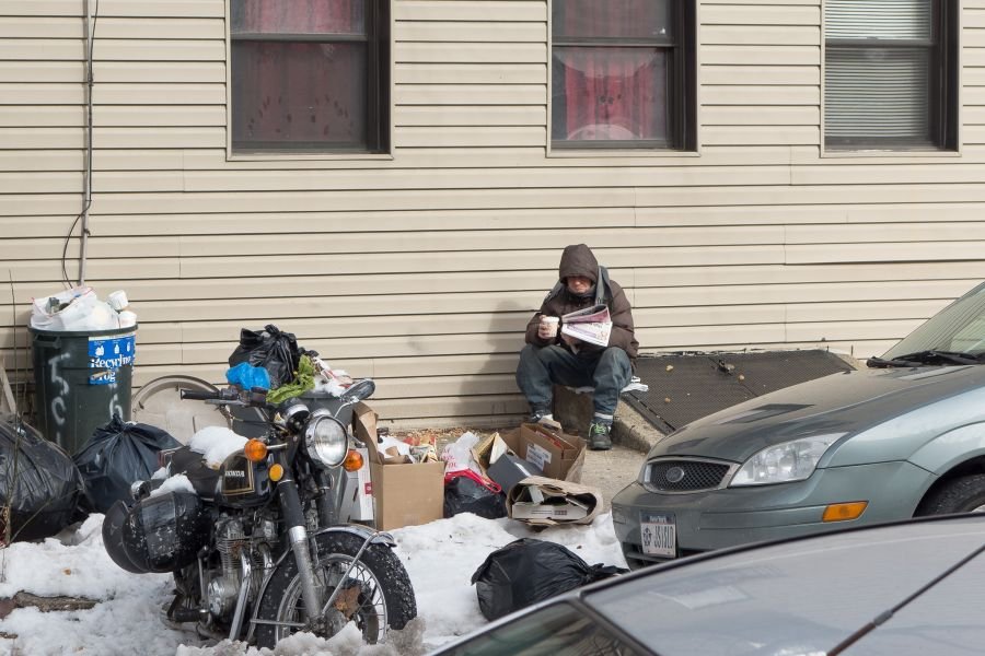 man with coffeee and newspaper