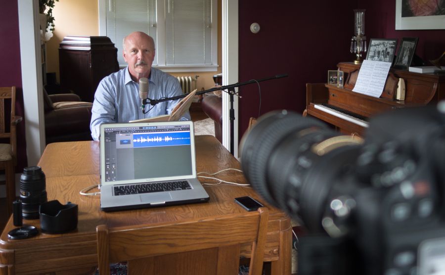 man prepares to make audio recording