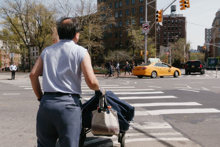US Postal Service Worker keeping cool, working on his tan.