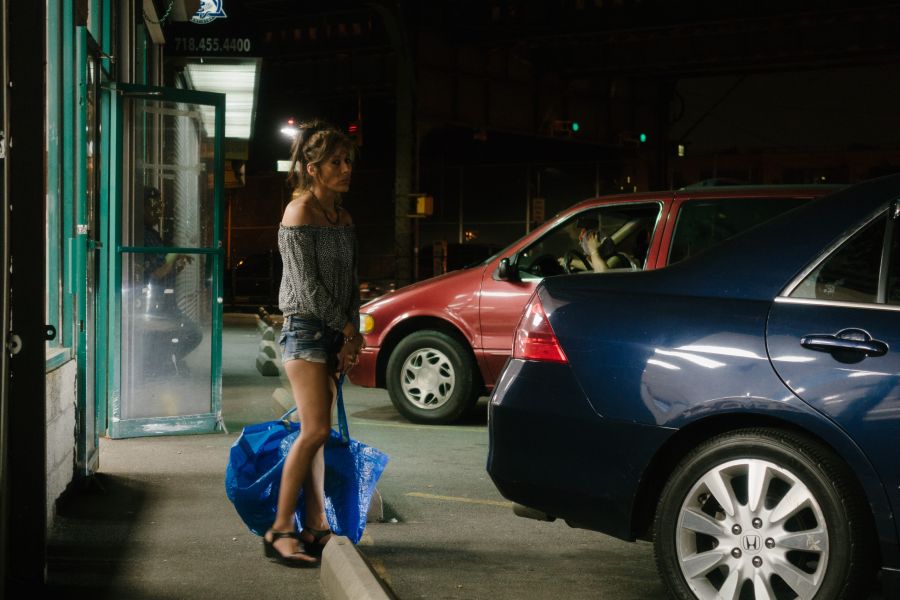 Woman with IKEA laundry bag